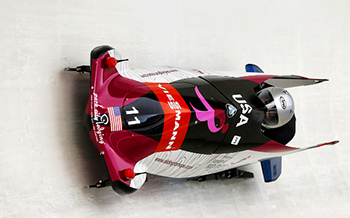 Image of Jazmine Fenlator driving sled.