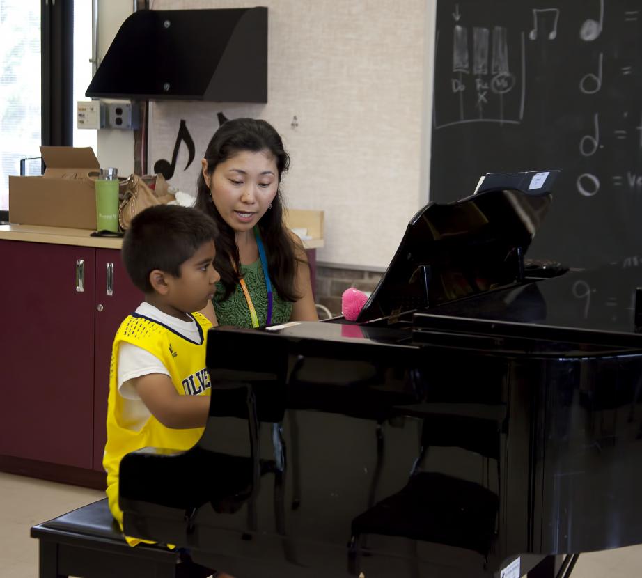Piano student with professor