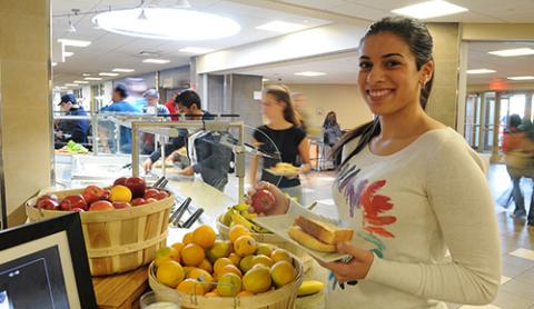 Student eats in Daly Dining Hall