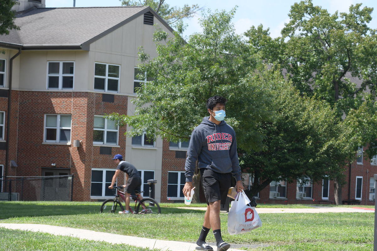 Rider student masked on campus