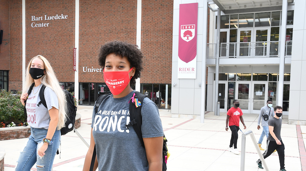 Rider student masked on campus