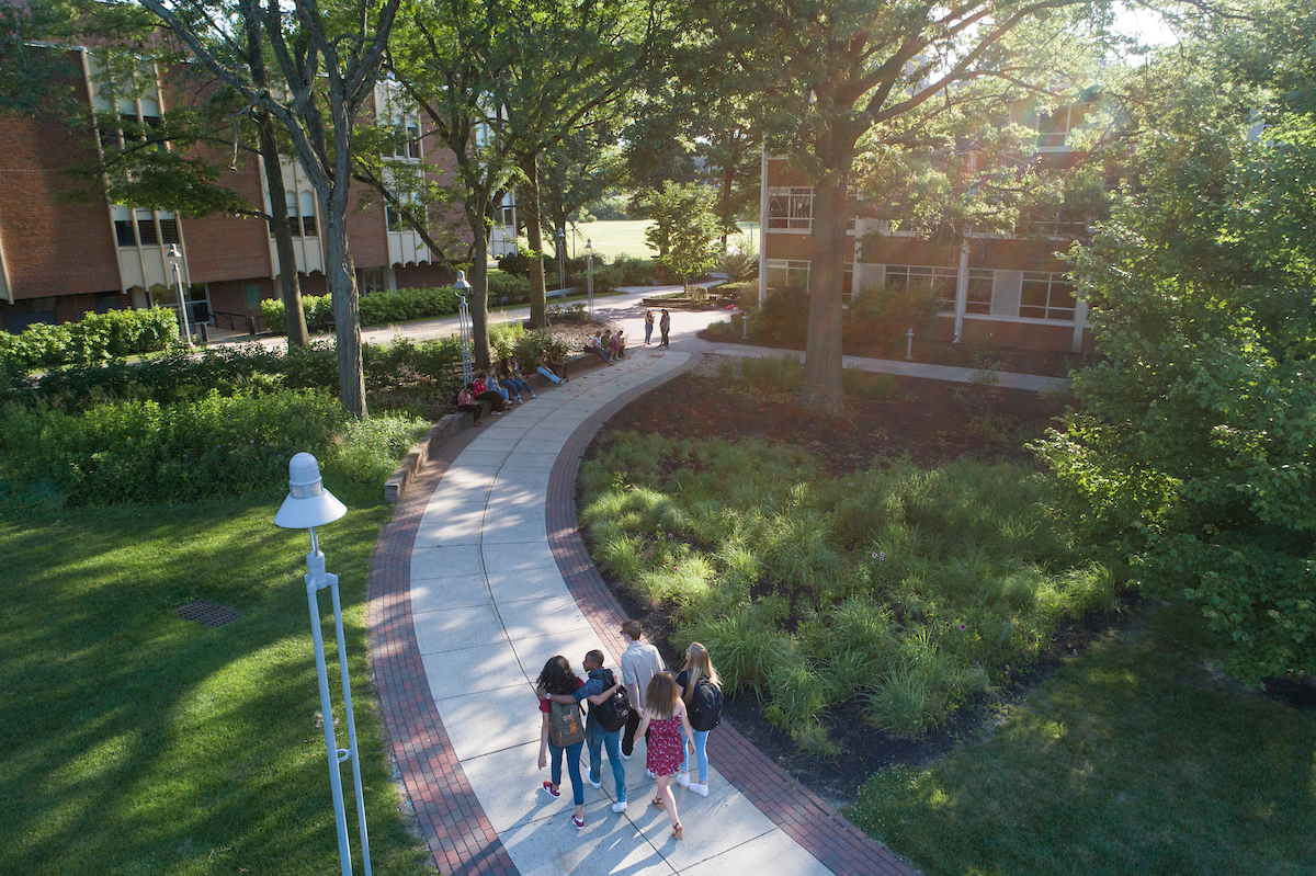 Aerial view of students walking on path