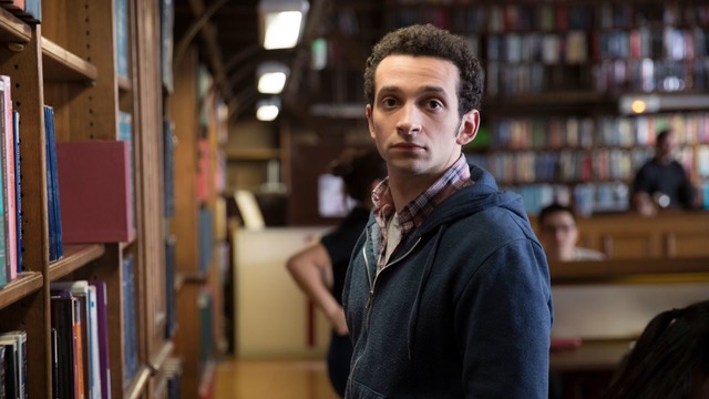student in library