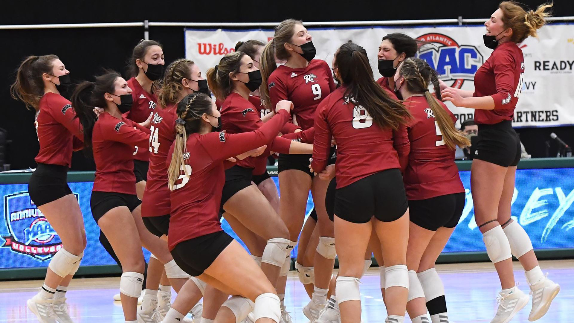 Volleyball team celebrates victory