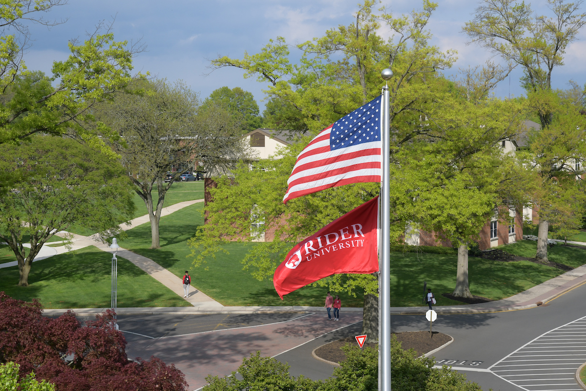 American flag and Rider flag on campus