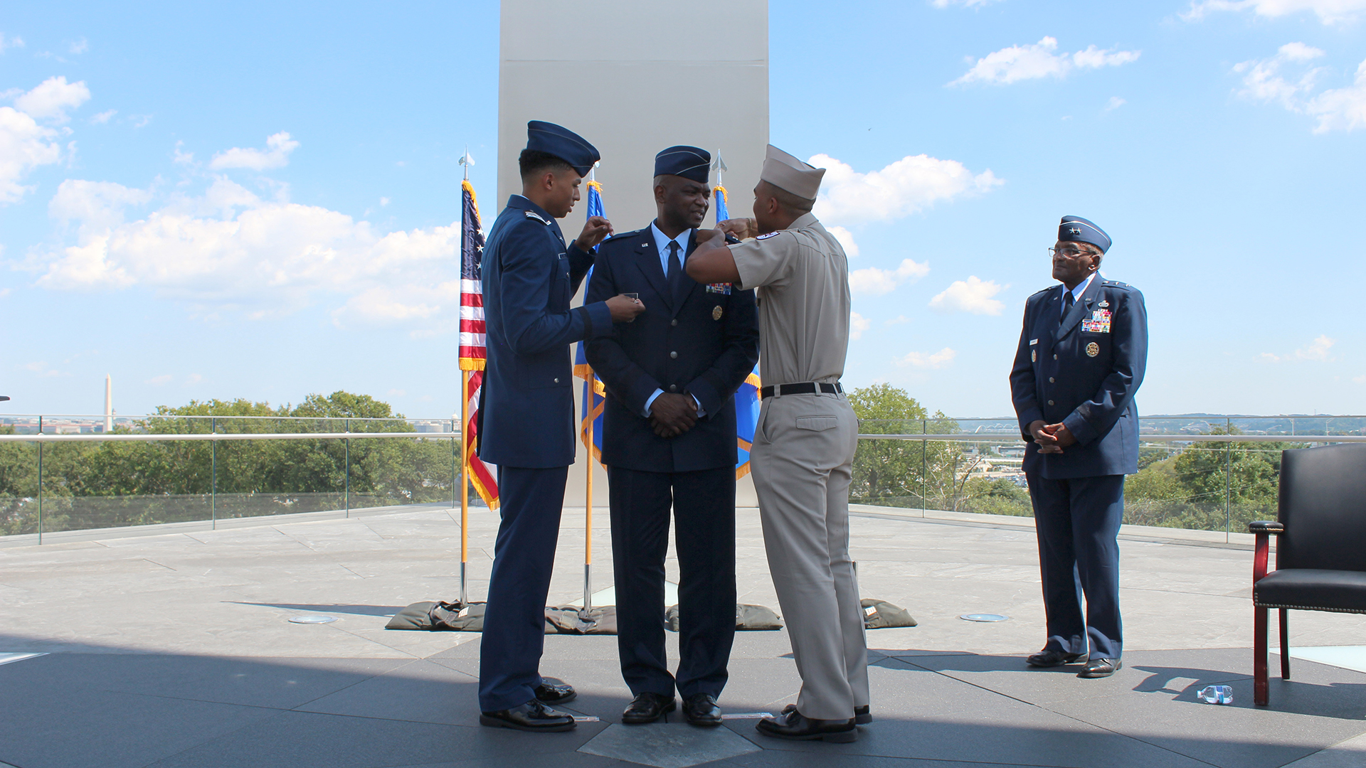 Brig. Gen. Alfred K. Flowers, Jr. (center), Air Force Medical Service Manpower, Personnel and Resources director, gets his brigadier general rank pinned