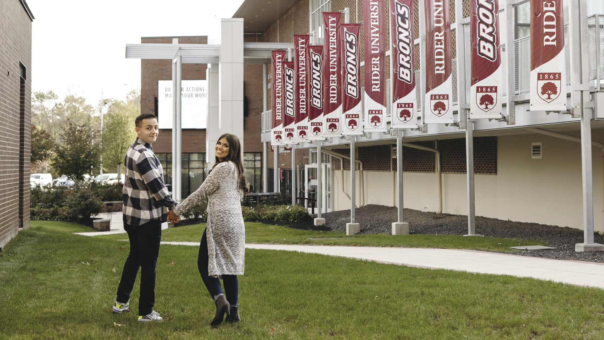 Dominique Pesco ’14, ’19 and Scott Taylor ’15