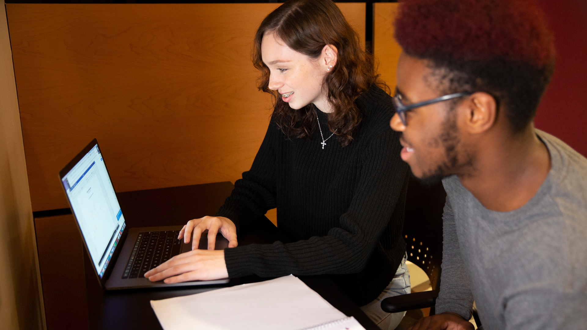 Two students at a computer