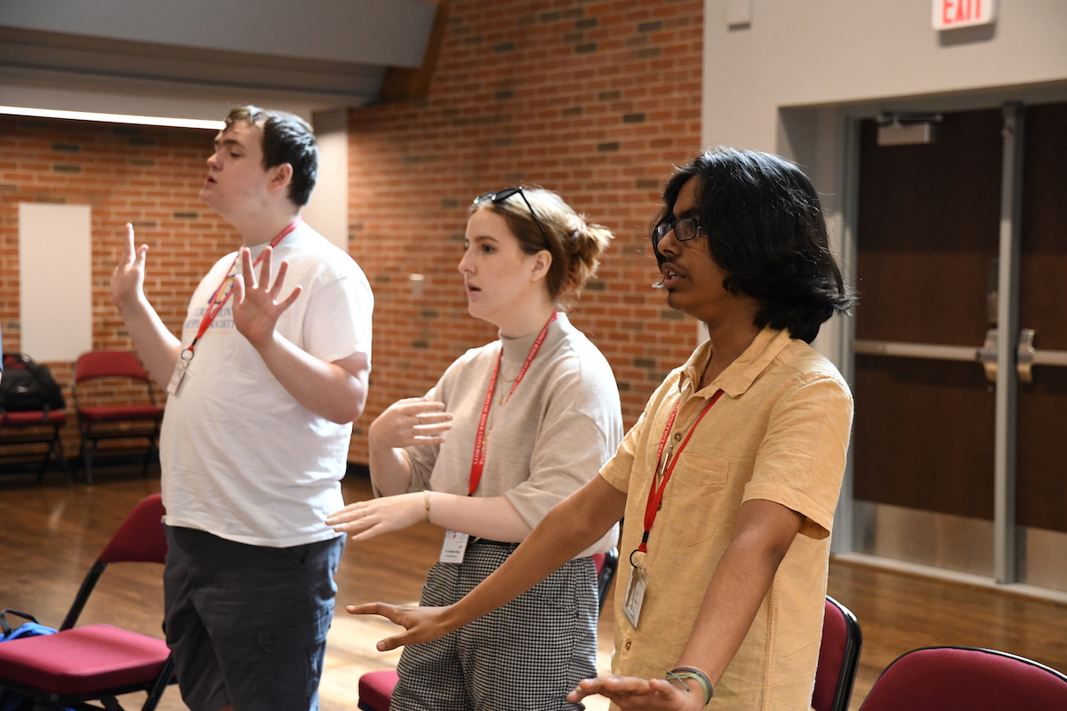 Vocal Institute students warm up.