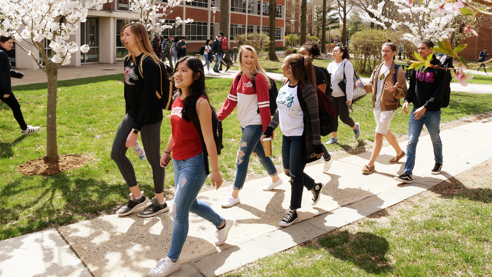 Rider students walk together on campus