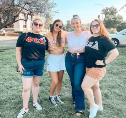 National Panhellenic Council students pose for photo on Campus green