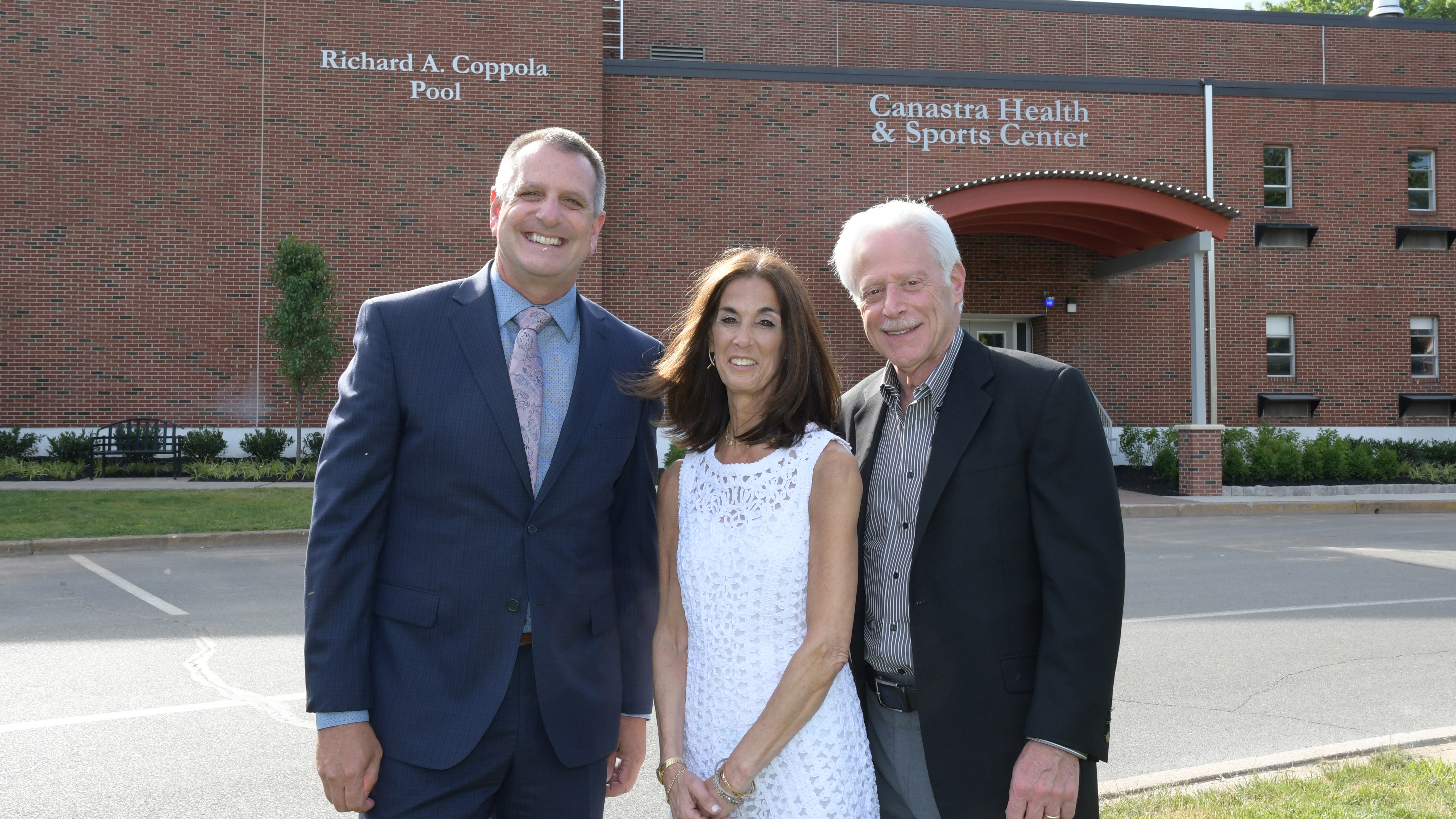 Athletic Director Don Harnum with Trustee Jill Hammer Canastra '72 and Wayne Canastra '72. The Canastras have made a record gift to the Rider Arena Project.