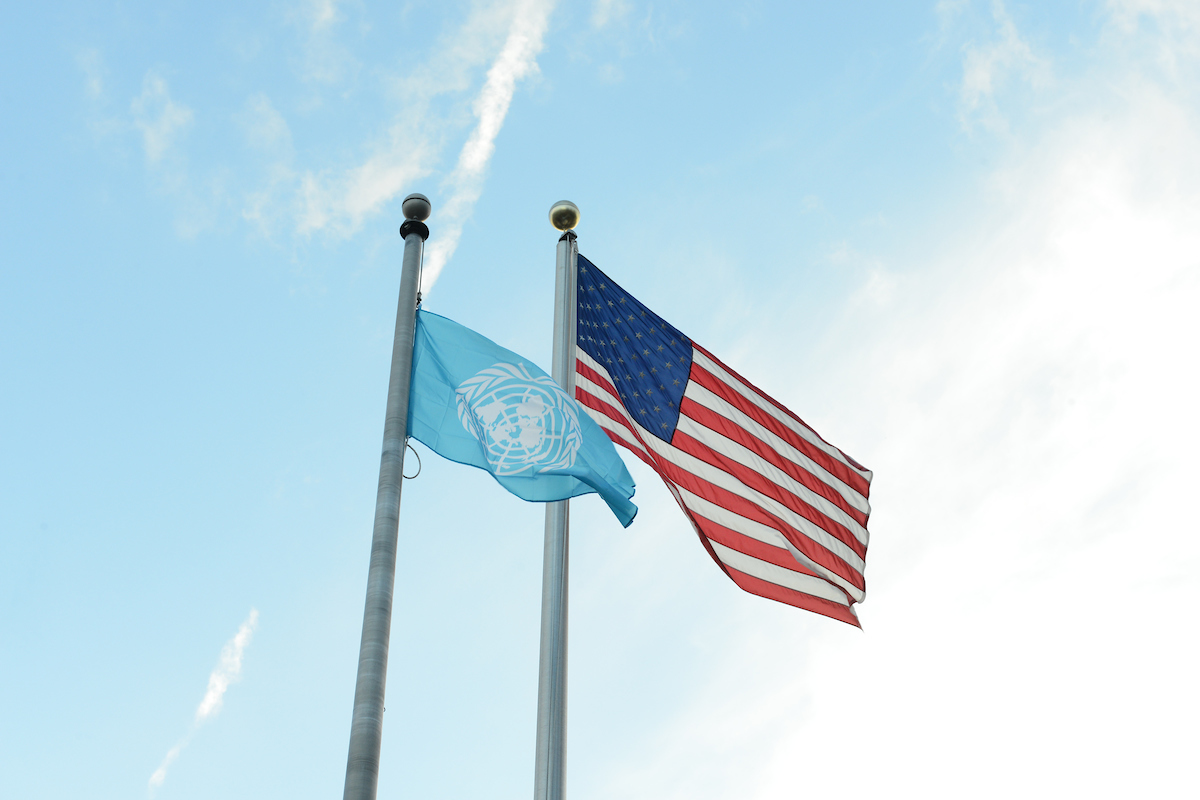 United Nations flag and American flag on poles