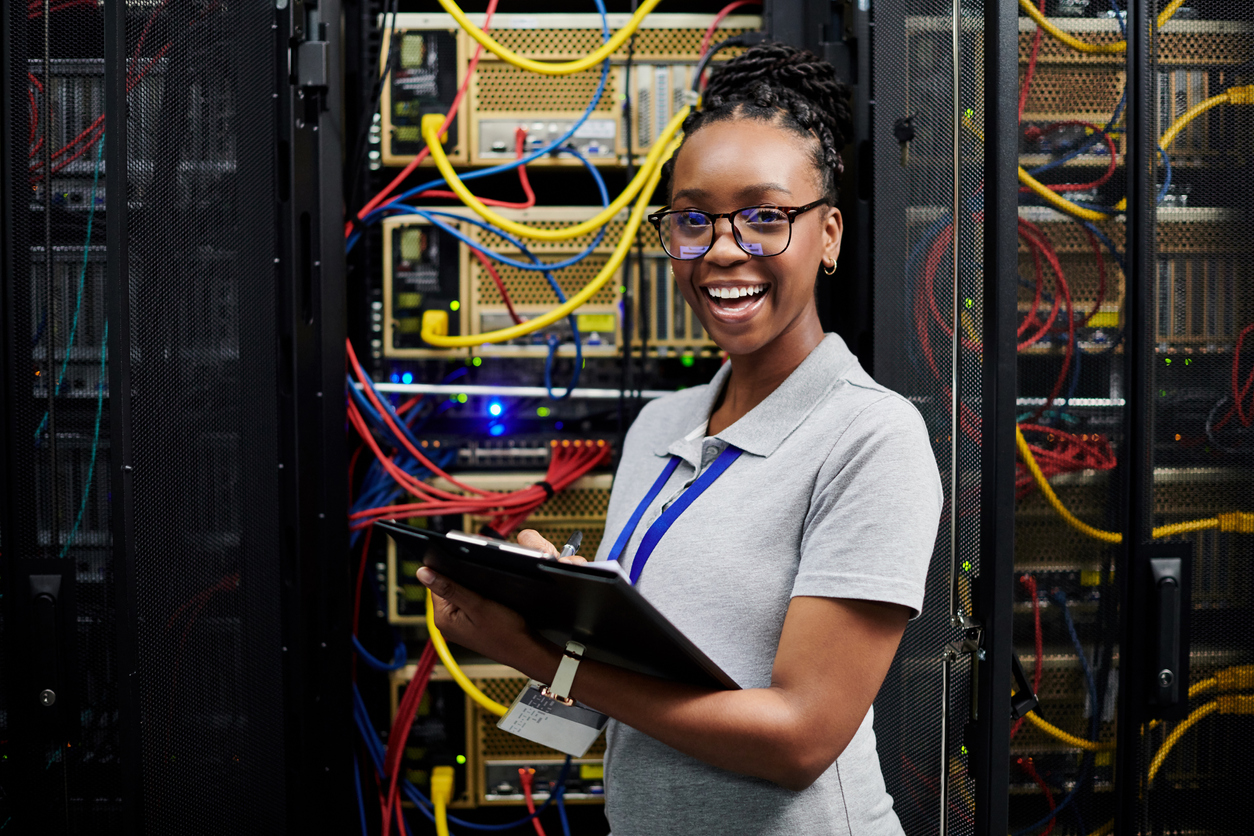 Female cybersecurity expert works with tablet