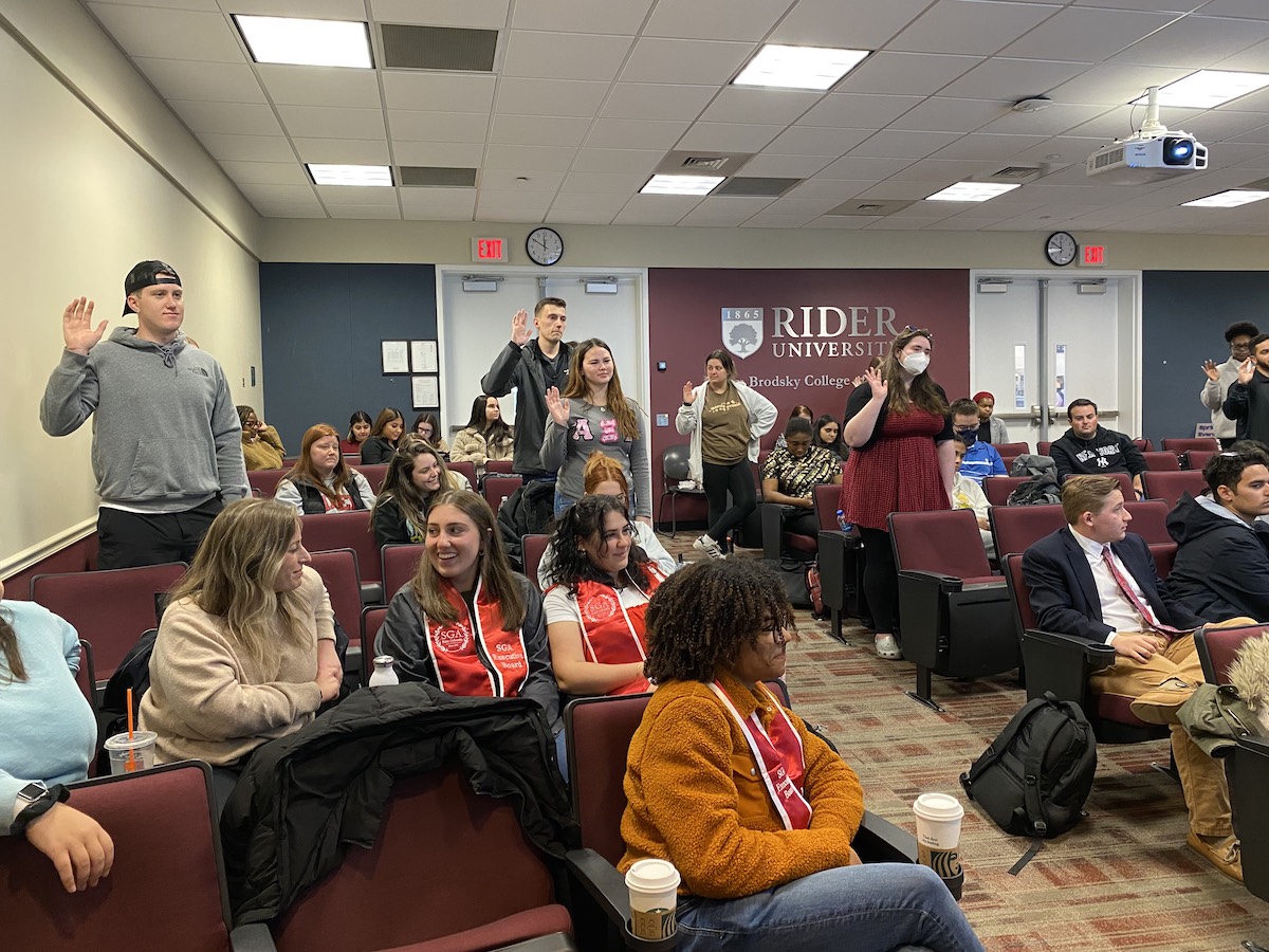 Students participate in a SGA Senate meeting