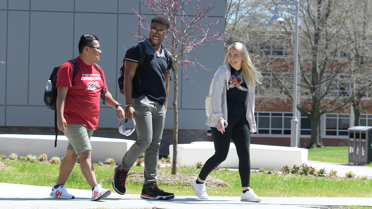 Students walking near science building