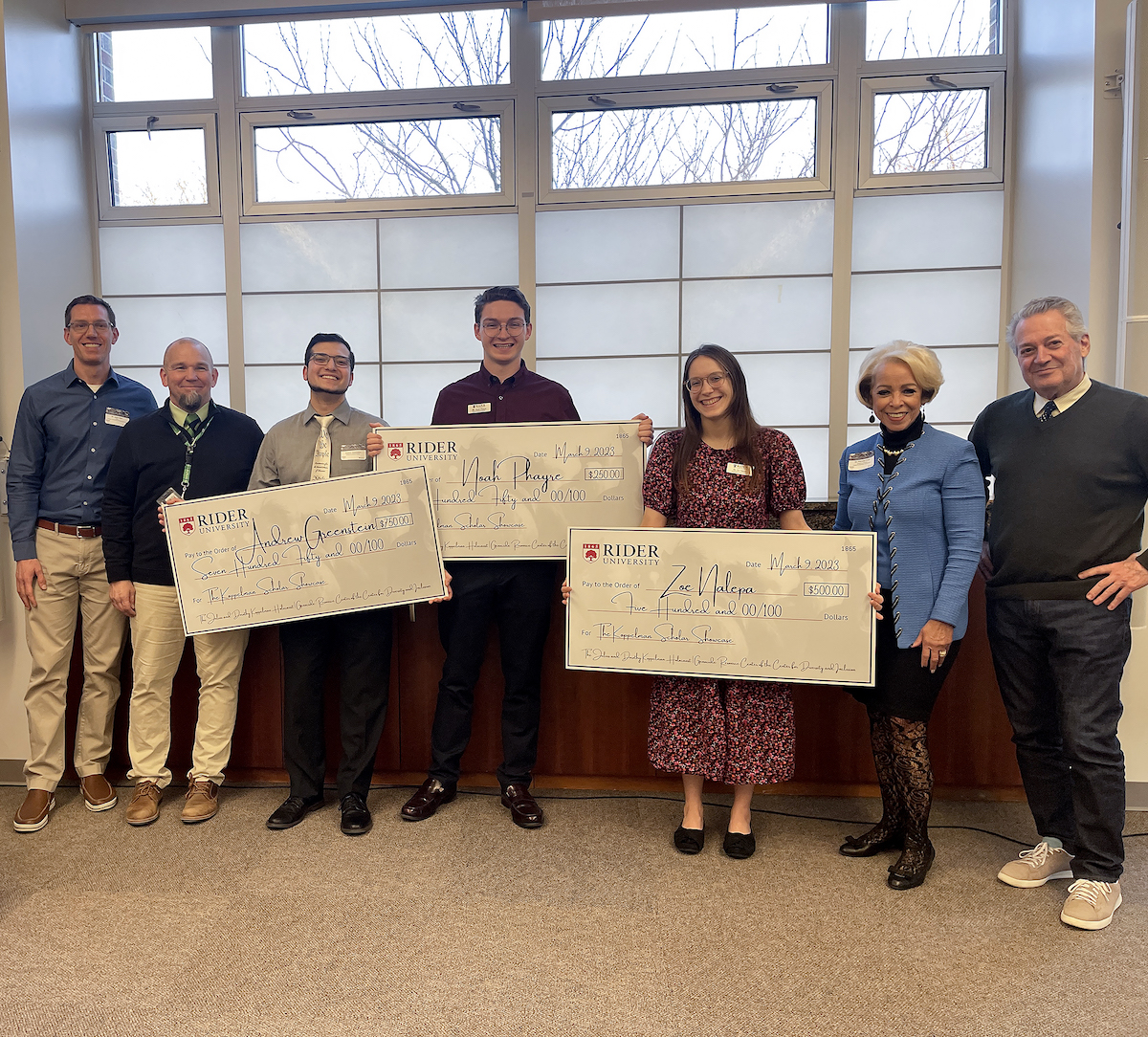 Presentation of Checks at Koppelman scholar event