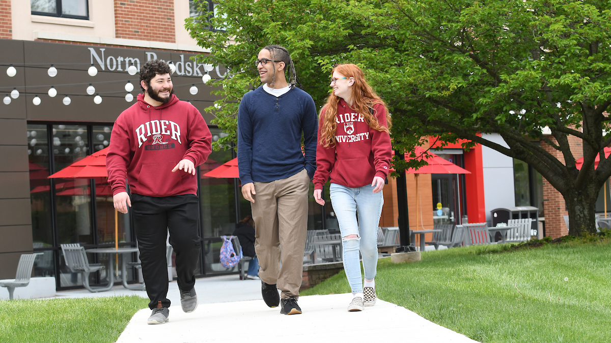 Students walking outside Sweigart