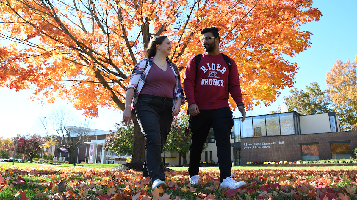 Students walking by Admissions