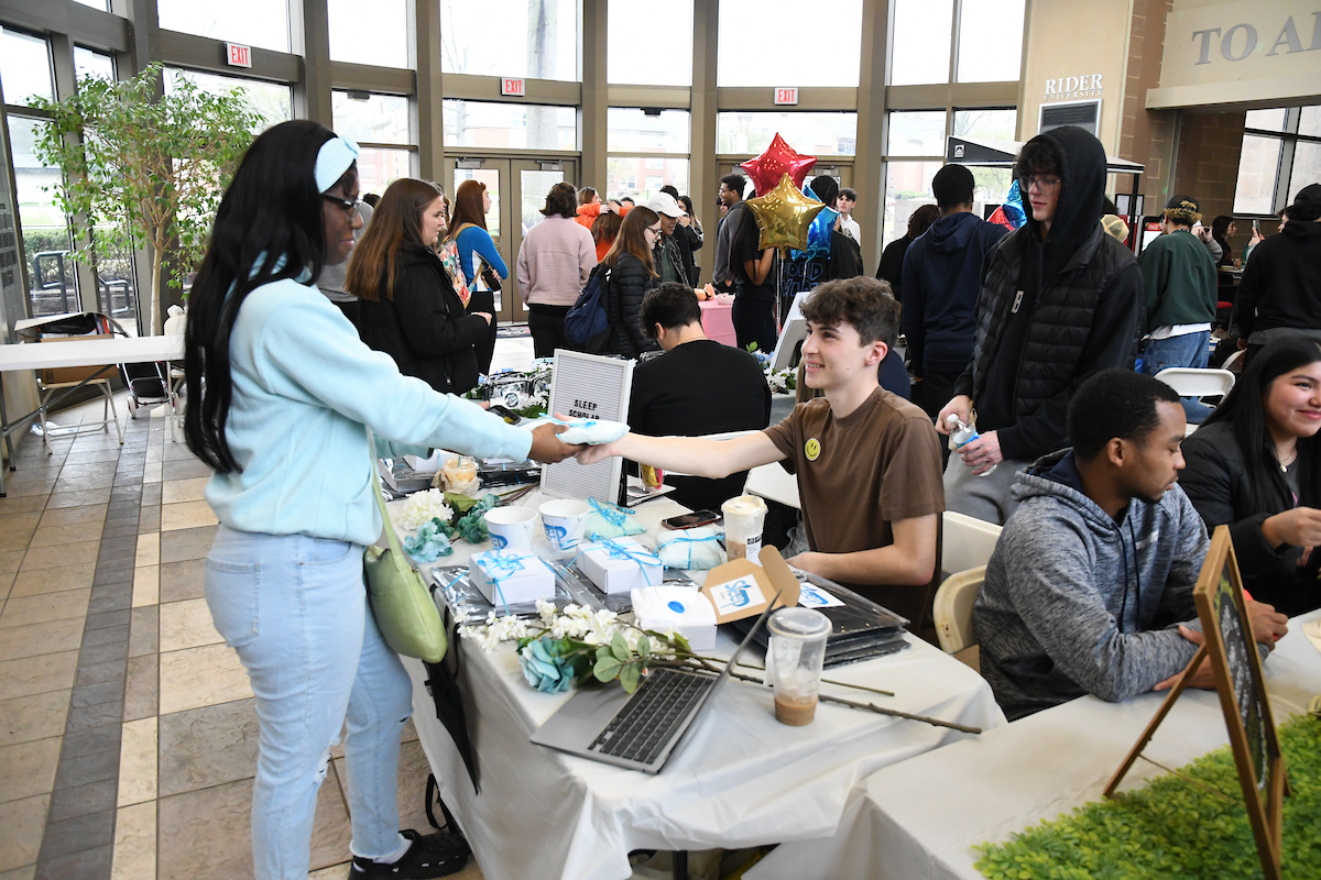 Students sell their products at the Business in Action Market Fair.