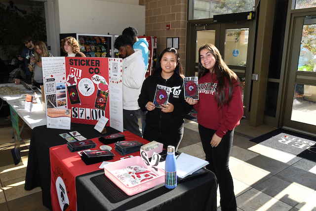 Students pose at the Market Fair.