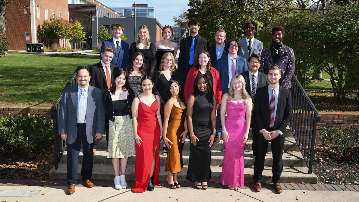 The executive staff of 107.7 The Bronc pose for a group photo on the Rider campus