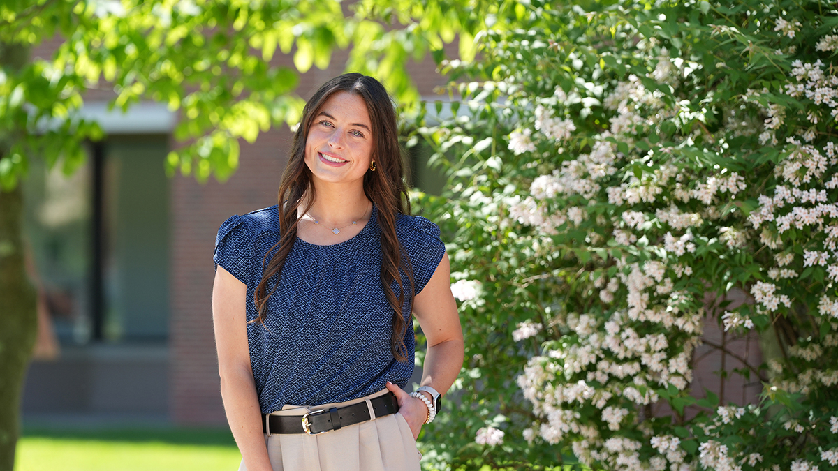 Allison Stewart poses for picture on campus