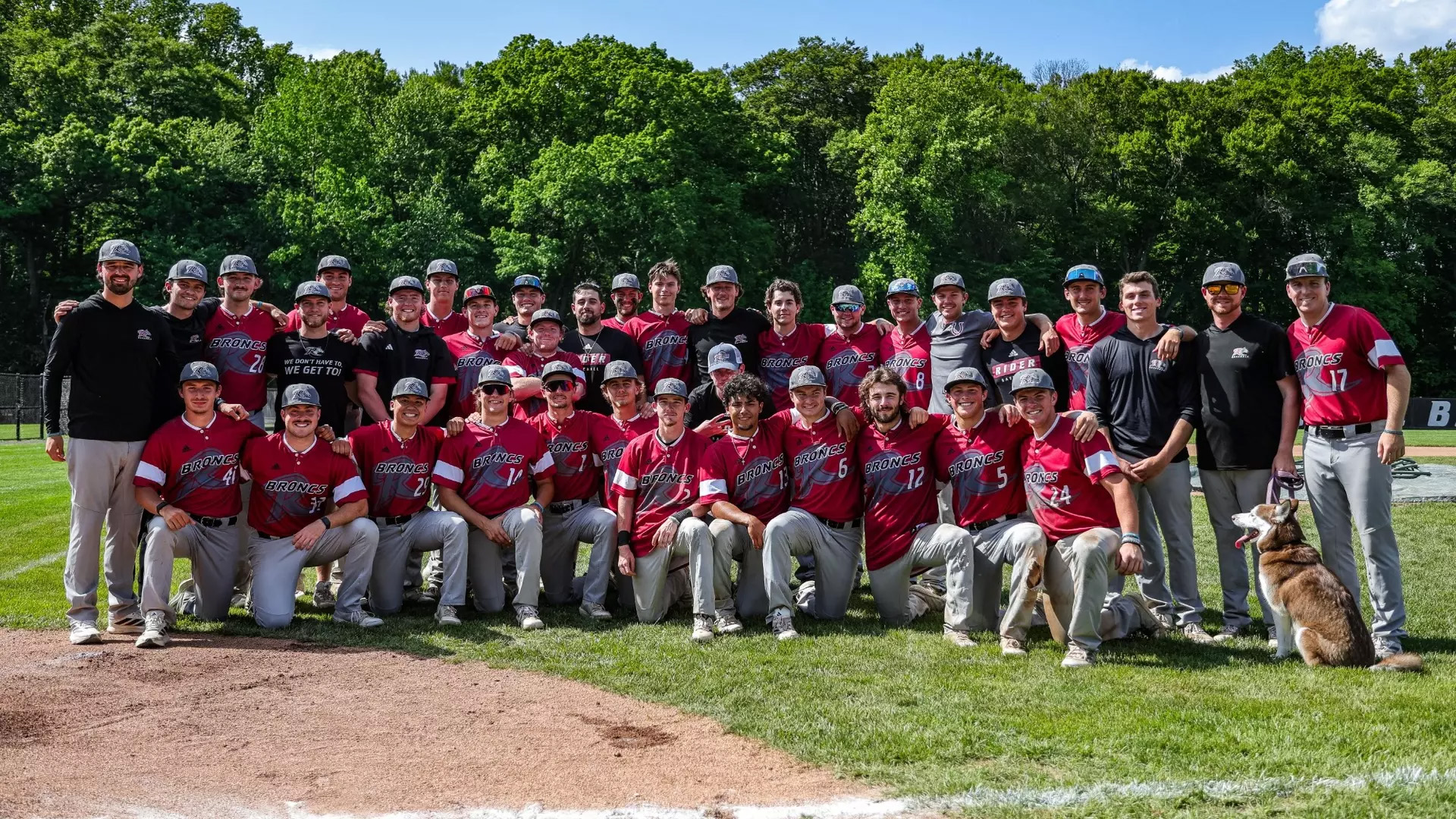 Baseball team poses after winning MAAC regular season title