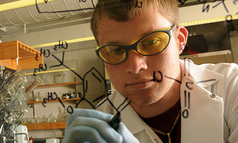 Explore Rider majors and success stories. Image of student in lab, Explore majors and success stories.