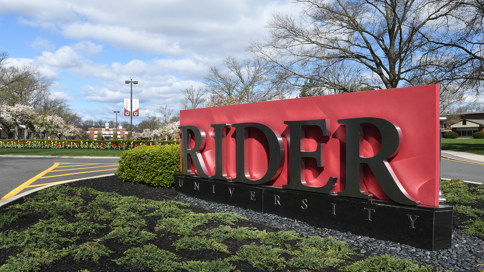Rider University sign at campus entrance.