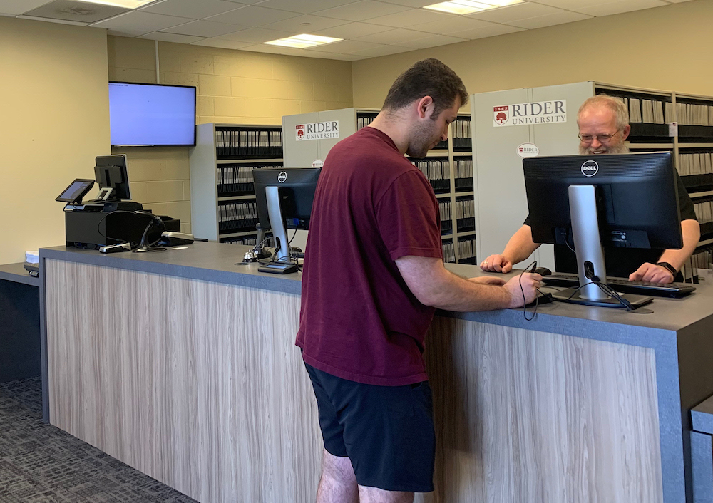 Rider student gets mail at Rider University mailroom