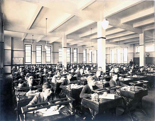 Students attending class circa early 1900s