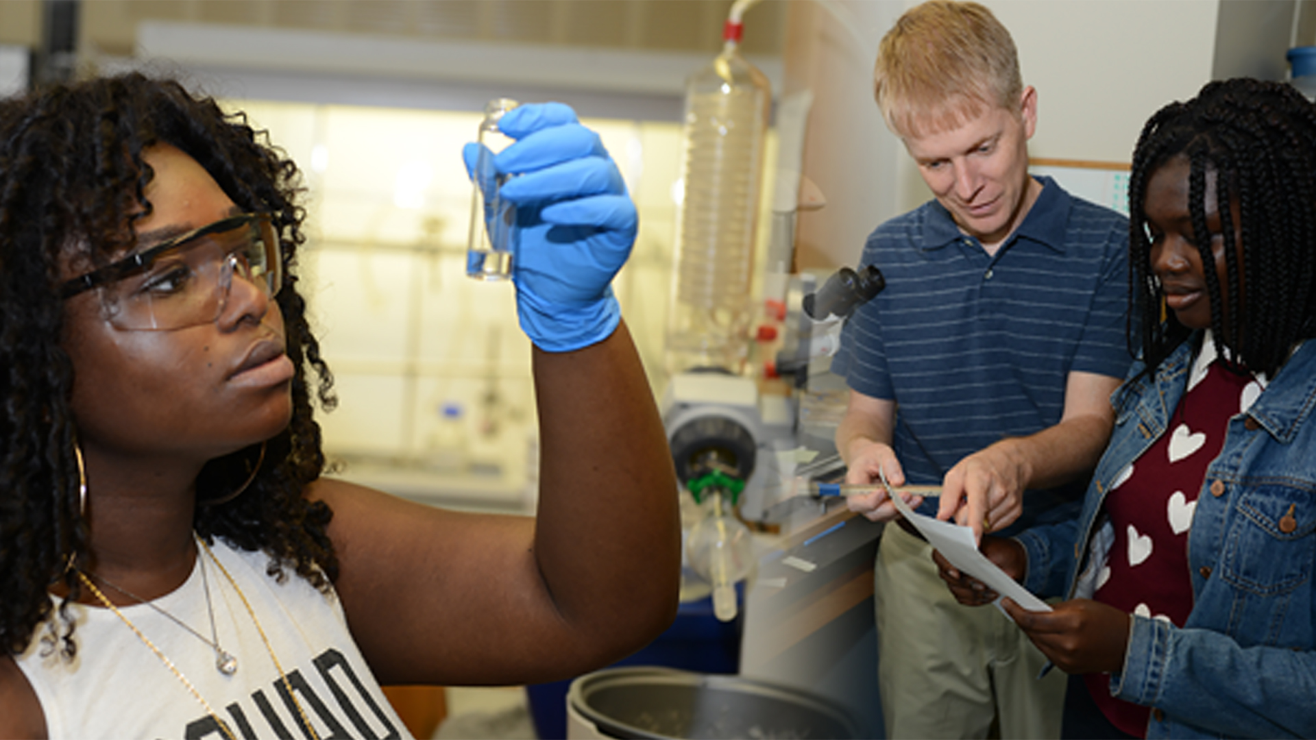 Student holds up vial in science class.