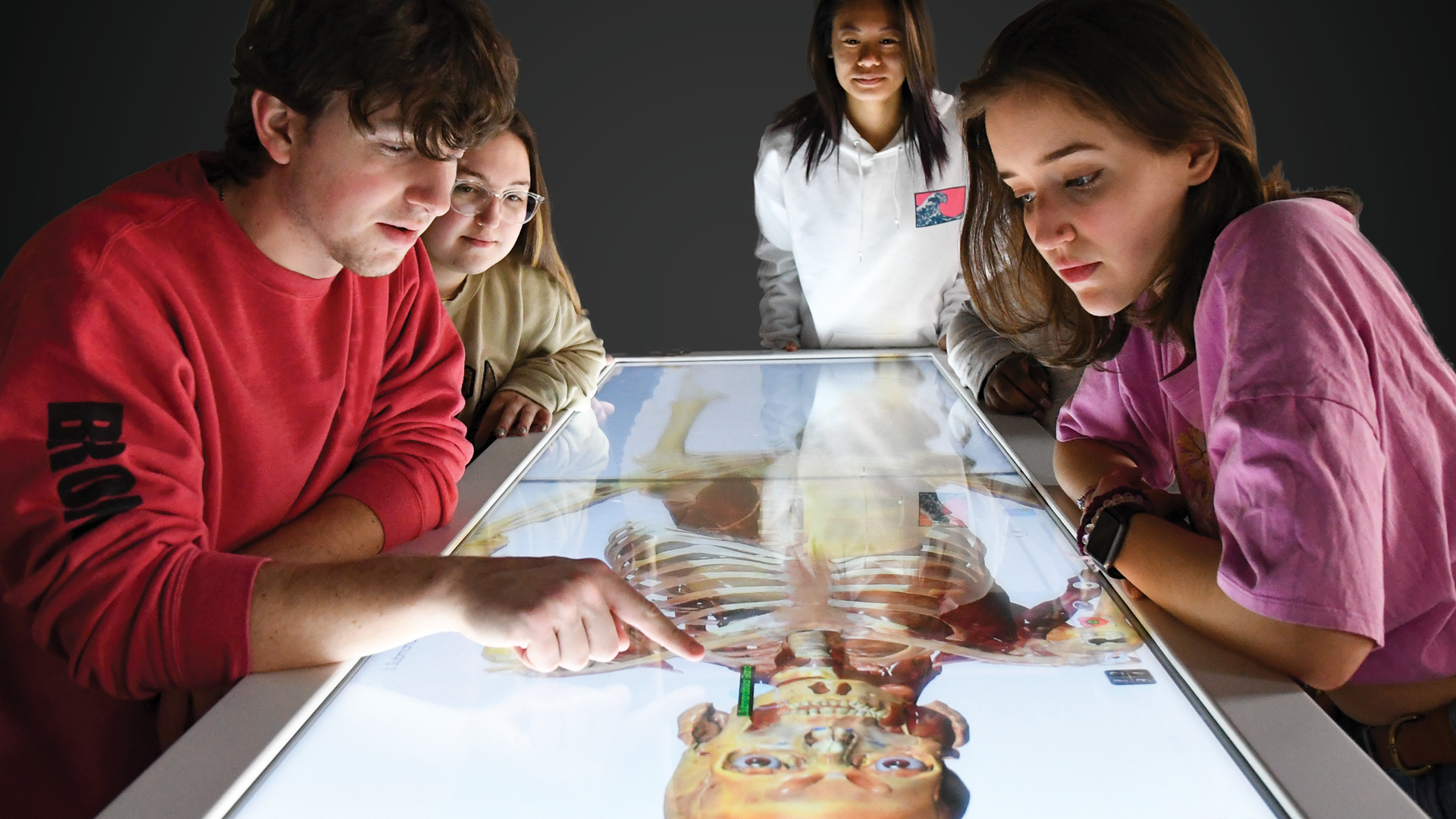 Rider students work with Anatomage table