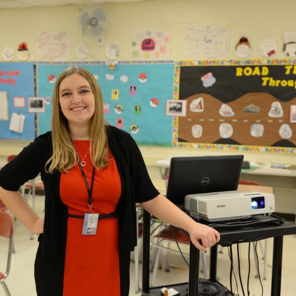 Karryne Maclean ’15 in a school classroom