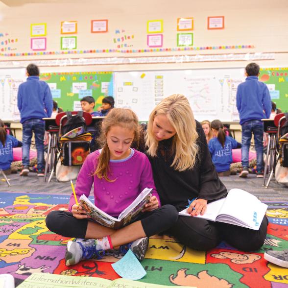 A student with a teacher.