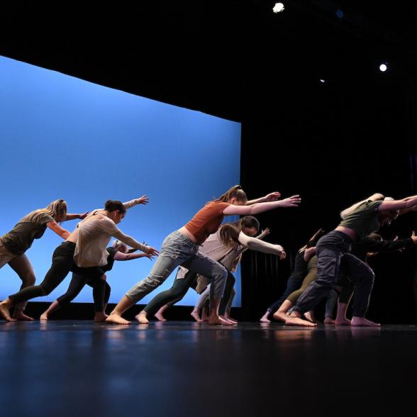 Dance students perform "Dreamers" onstage