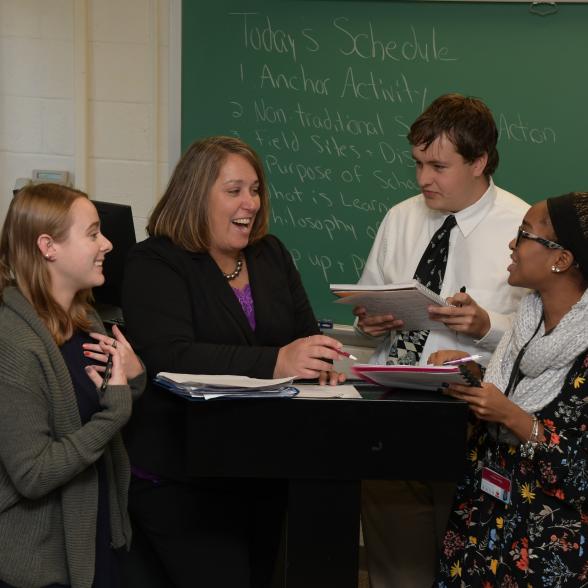 Professor Tracey Garrett speaks with education students