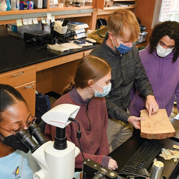 Dr. Daniel Druckenbrod and students work in lab