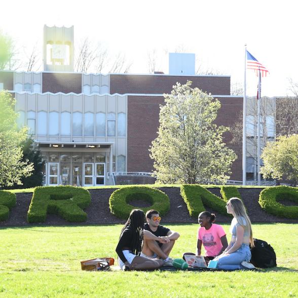 Students sitting on Campus Mall