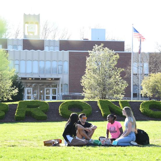 Students sitting on Campus Mall