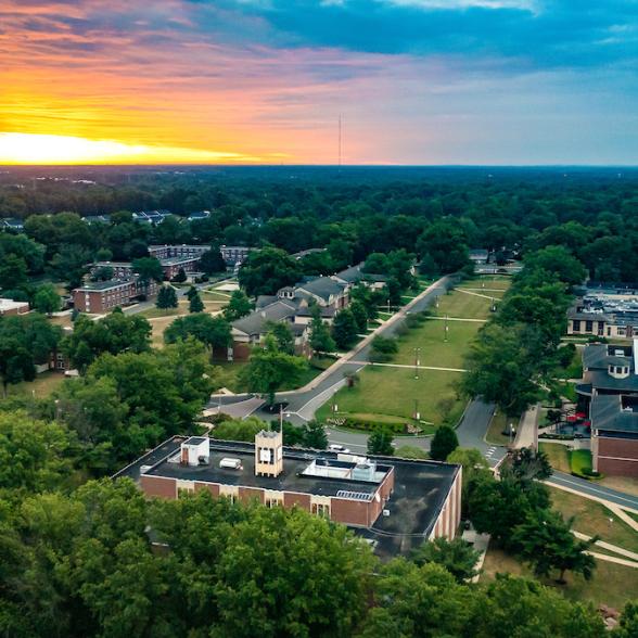 Bird's eye view of sunrise over campus