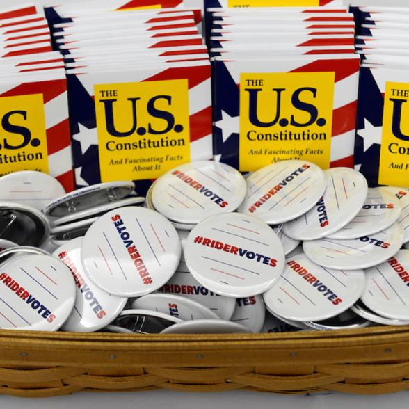 A basket of Rider Votes buttons