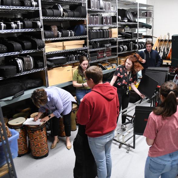 Students prepare for music lesson