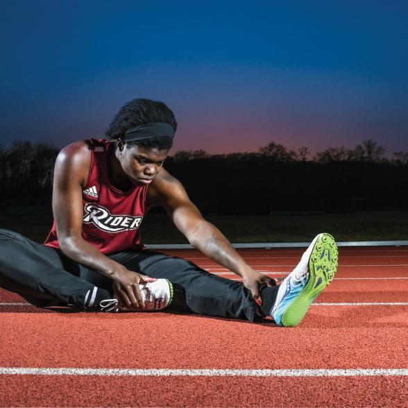 Despite severe early-life challenges, freshman earns spot on track team