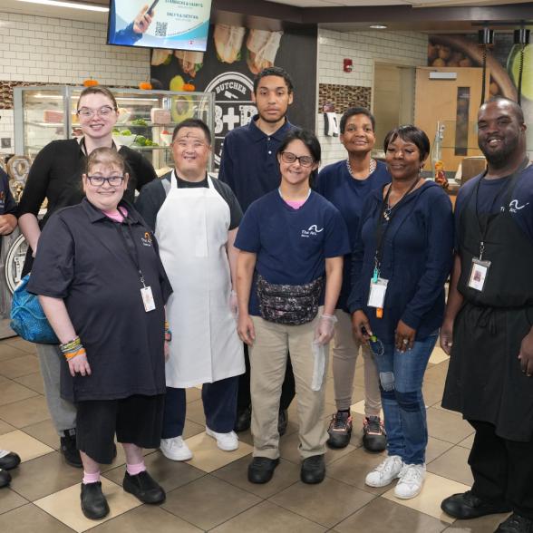 Members from The Arc working in Daly Dining Hall