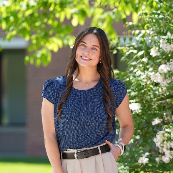 Allison Stewart poses for picture on campus