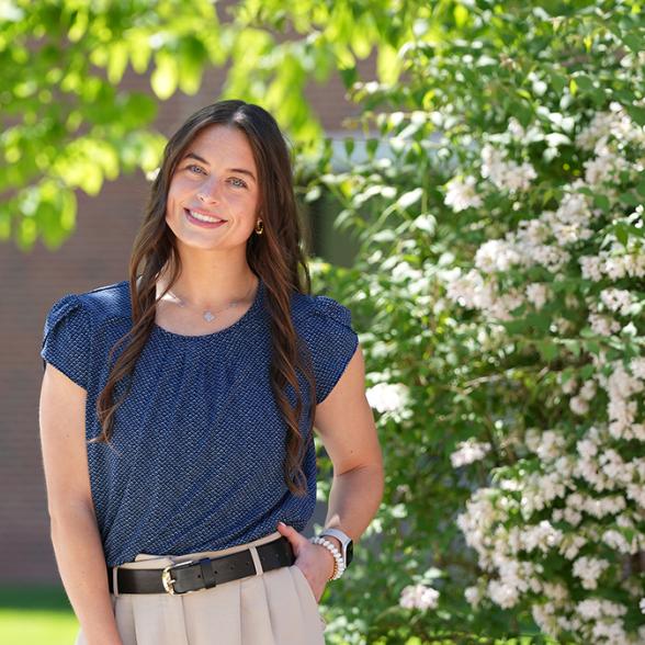 Allison Stewart poses for picture on campus