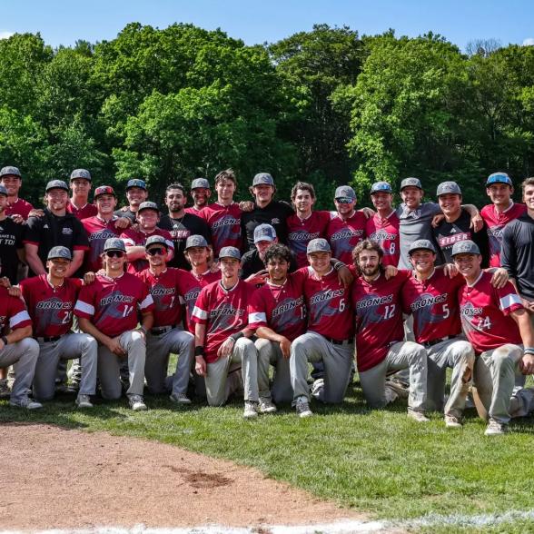 Baseball team poses after winning MAAC regular season title