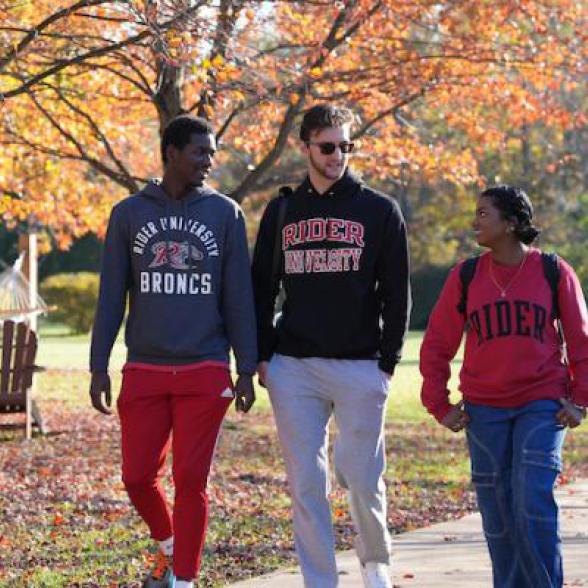 students walking on Rider campus in fall